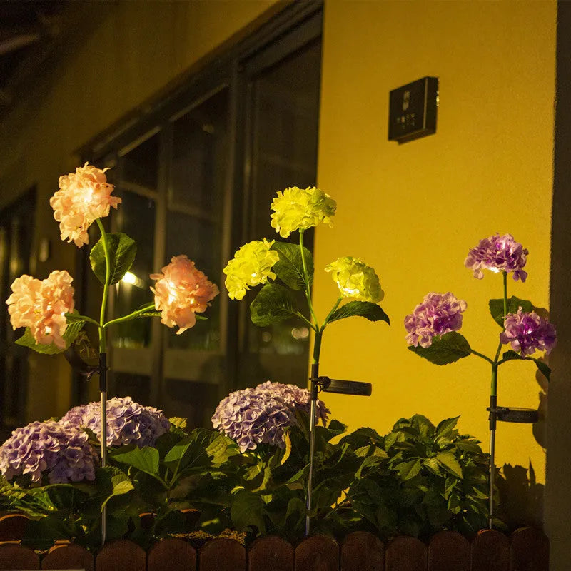 Solar hydrangea garden decorative light in garden setting with floor outlet placement