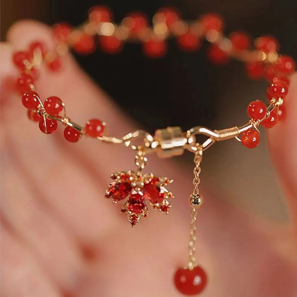 Red ginkgo leaf magnetic bracelet with electroplated alloy finish and adjustable sizing