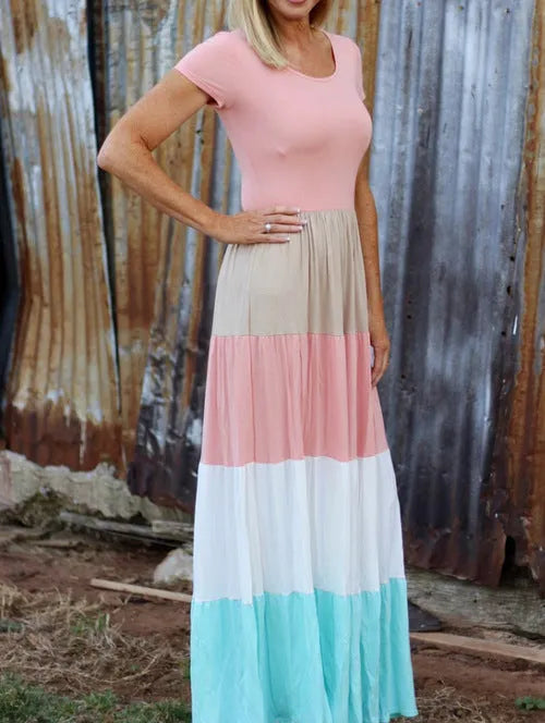 Short-sleeved pink parent-child dress with large swing skirt and round neck on a woman and child