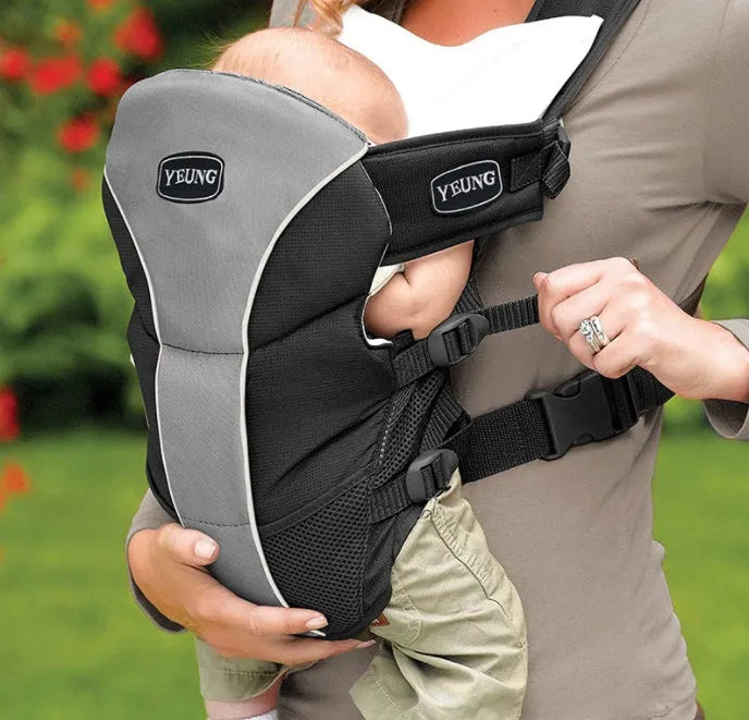 Double-shoulder baby carrier showing face-to-face carrying position with adjustable straps