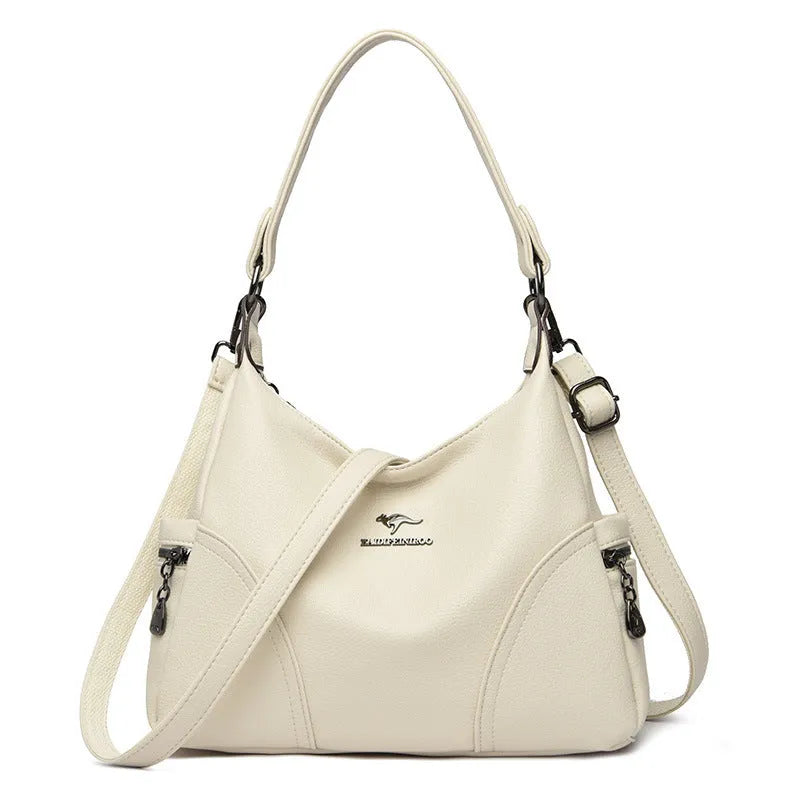 Women's soft PU shoulder bag in black, horizontal square shape with single strap and lined interior.