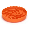 Food-grade silicone slow feeder dog bowl in blue with suction cup base and raised maze ridges