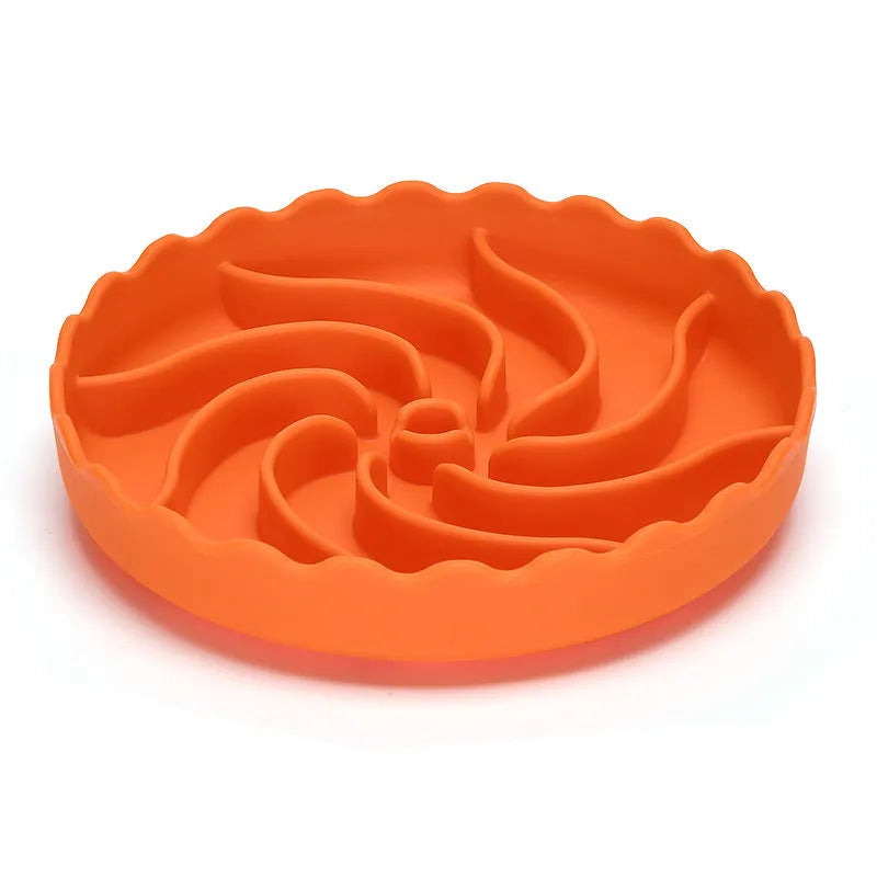 Food-grade silicone slow feeder dog bowl in blue with suction cup base and raised maze ridges