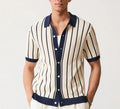 Men's white asymmetric lapel knit top with short sleeves on a model.
