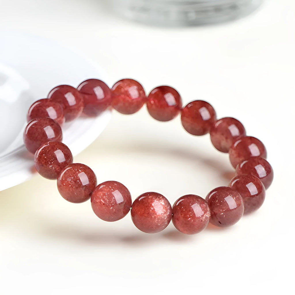 Natural strawberry quartz crystal bracelet with cherry red colour and geometric beads
