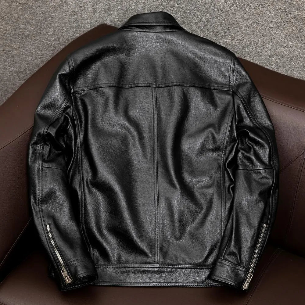 Men's brown plus size lapel leather jacket with side pockets on a hanger
