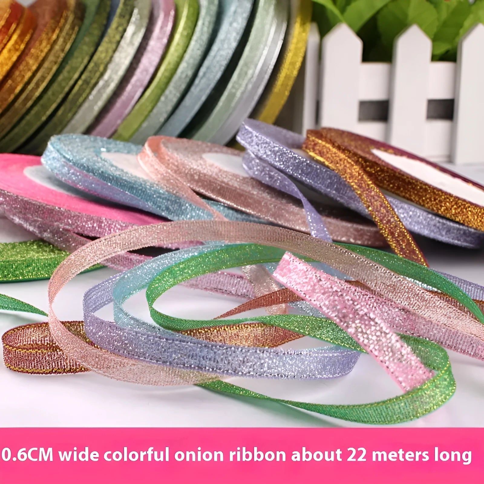 Roll of 0.6cm wide decorative polyester ribbon in a choice of 21 colours including metallic options.