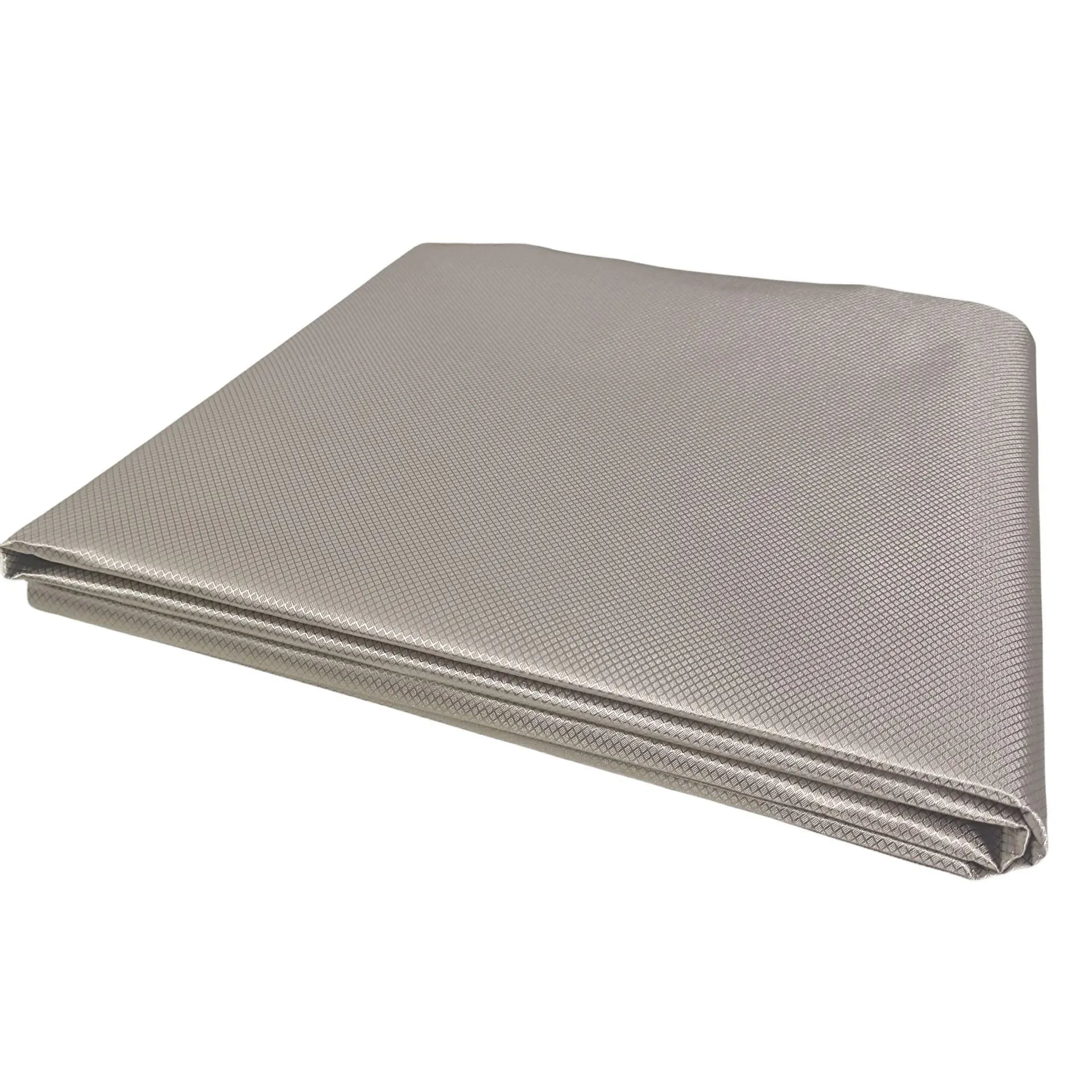 Grey diamond lattice pattern signal shielding fabric with copper and nickel weave.