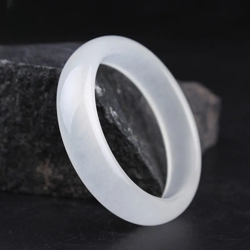 Gao Bing Jade ice-like white moonlight bracelet in flat rod and round rod styles on a neutral background.