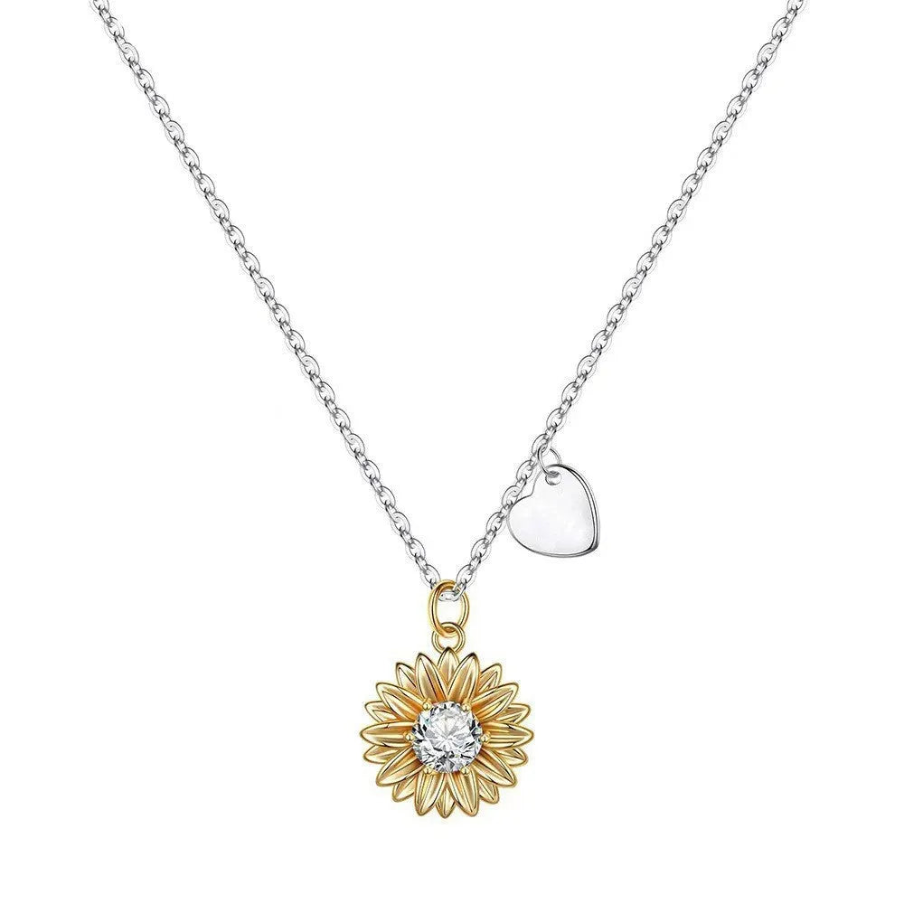 925 sterling silver sunflower pendant necklace on a cross chain, adjustable from 21cm to 50cm.