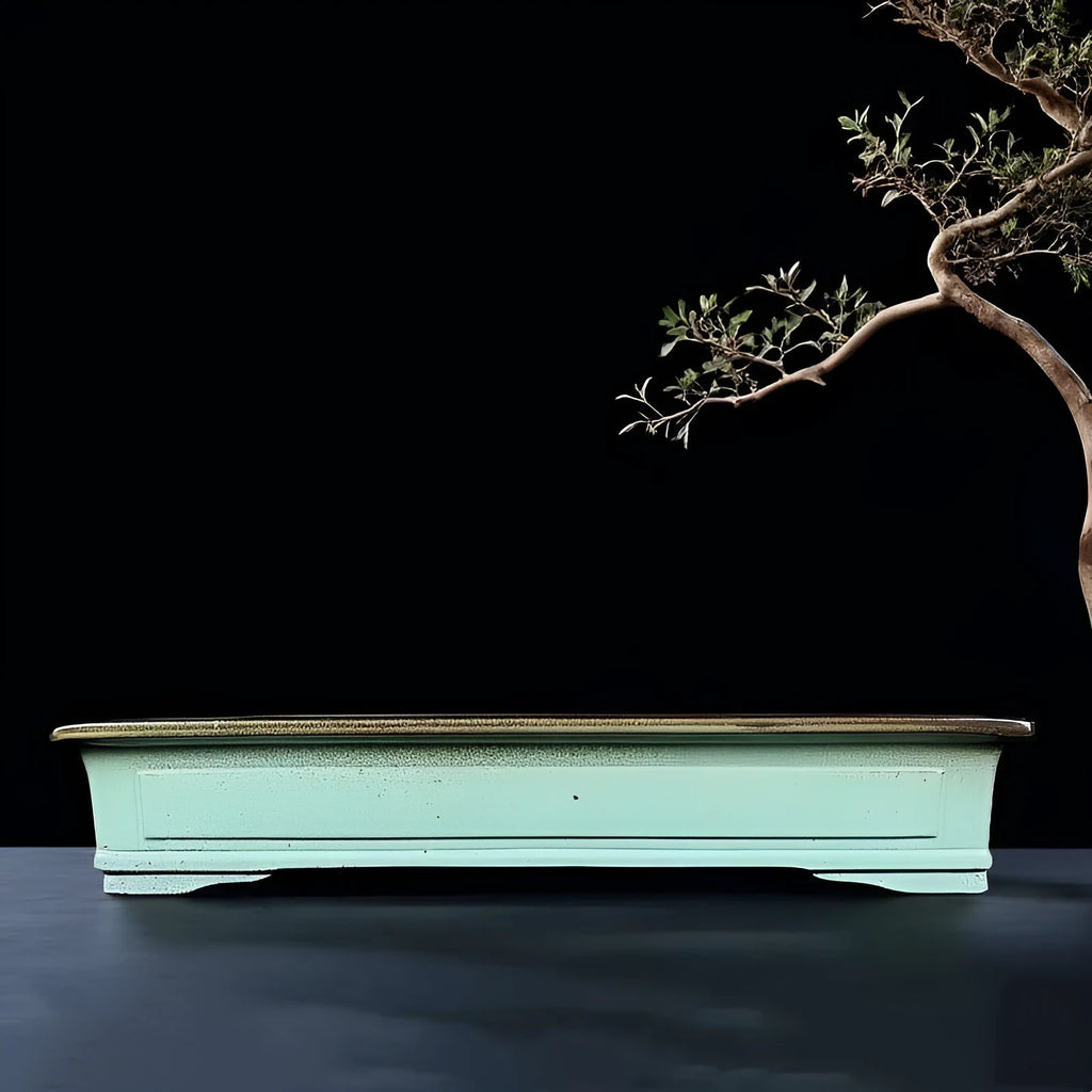 Green handmade ceramic bonsai pot with a retro purple sand crackled glaze finish.