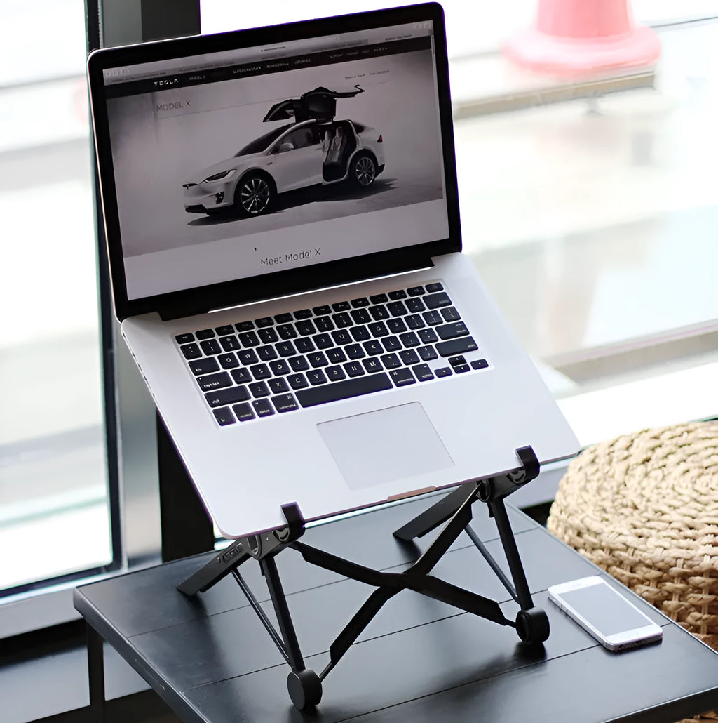 Black folding laptop stand with reinforced nylon construction shown in open and folded positions