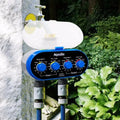 Dual timed irrigation controller for automatic garden watering with battery compartment and hose connections