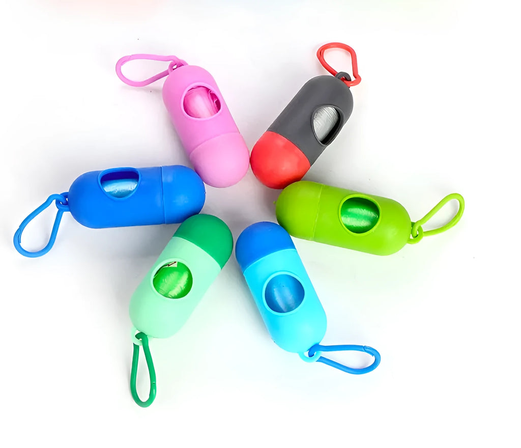 Roll of coloured pet waste disposal bags showing size of 22.5 by 30 centimetres