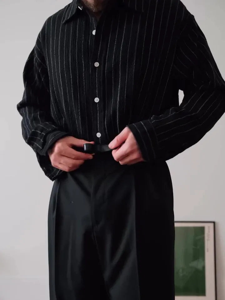 Black pinstriped men's button-down shirt with long sleeves and a regular fit.