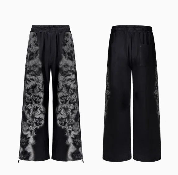 Women's loose fit printed tracksuit set including a hoodie, full-length trousers, and matching seven-inch shorts.