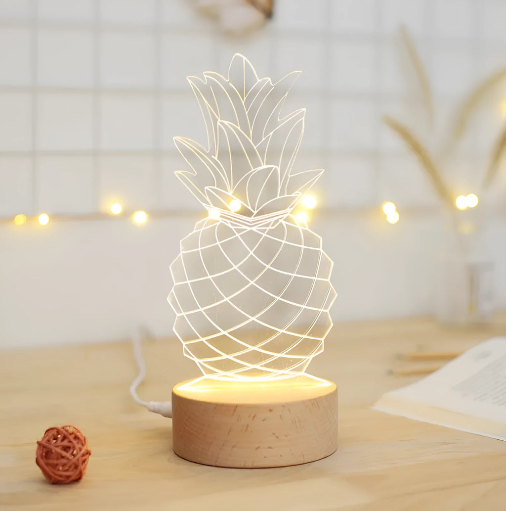 Cartoon pineapple-shaped night light on a wooden base with USB cable and dimmer switch.