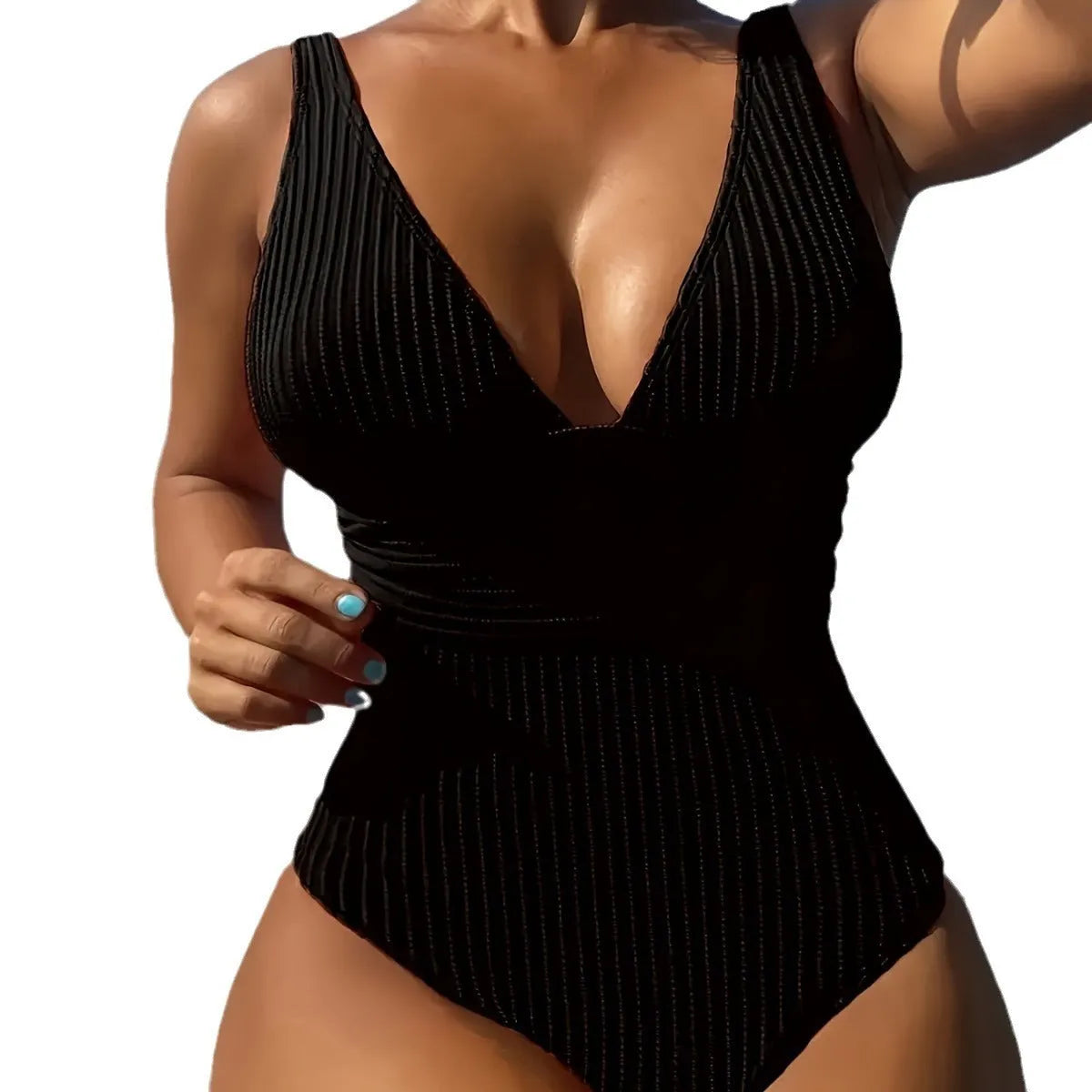 Women's one-piece sling flab hiding swimsuit in black polyester fabric, available in size M