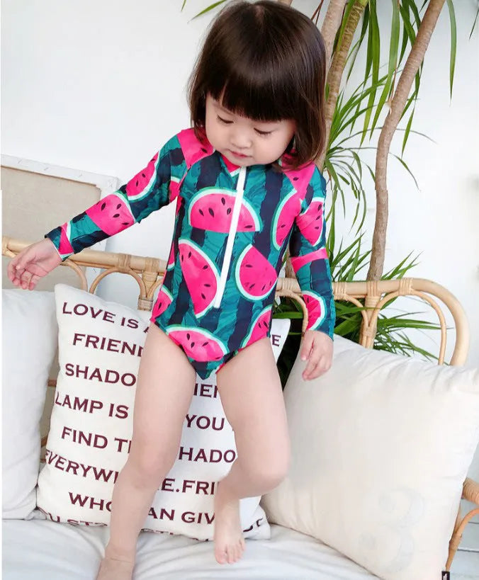 Cool watermelon children's long sleeve swimsuit set with fruit print on a white background