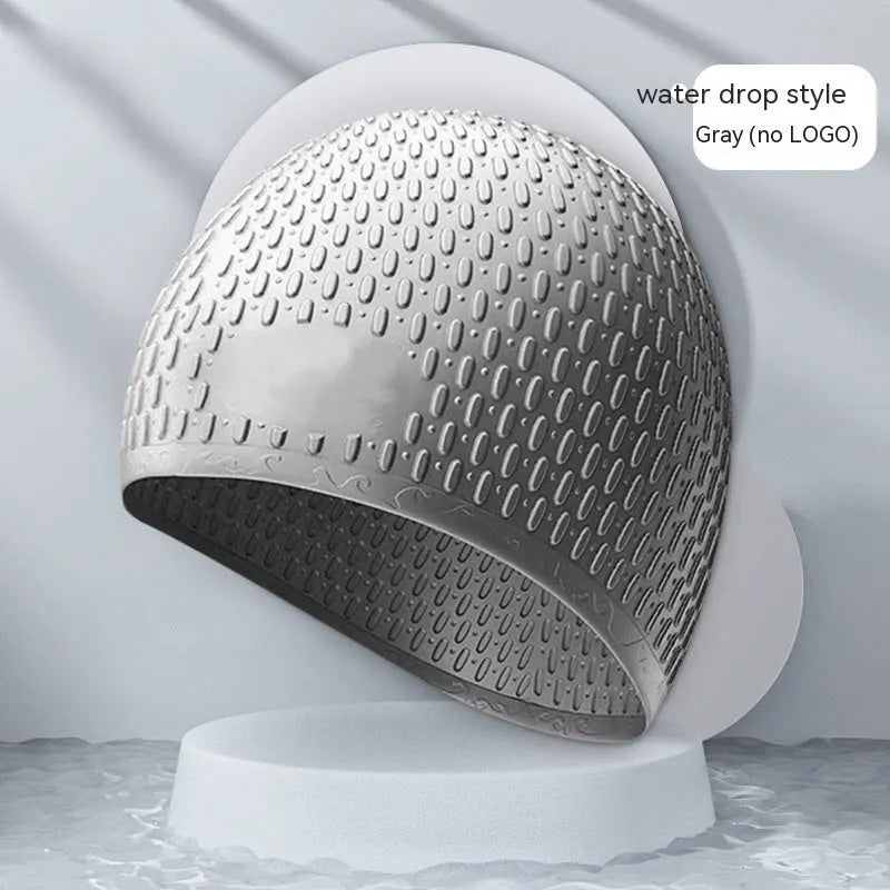 Silicone water drop swimming cap for adults in various solid colours on white background