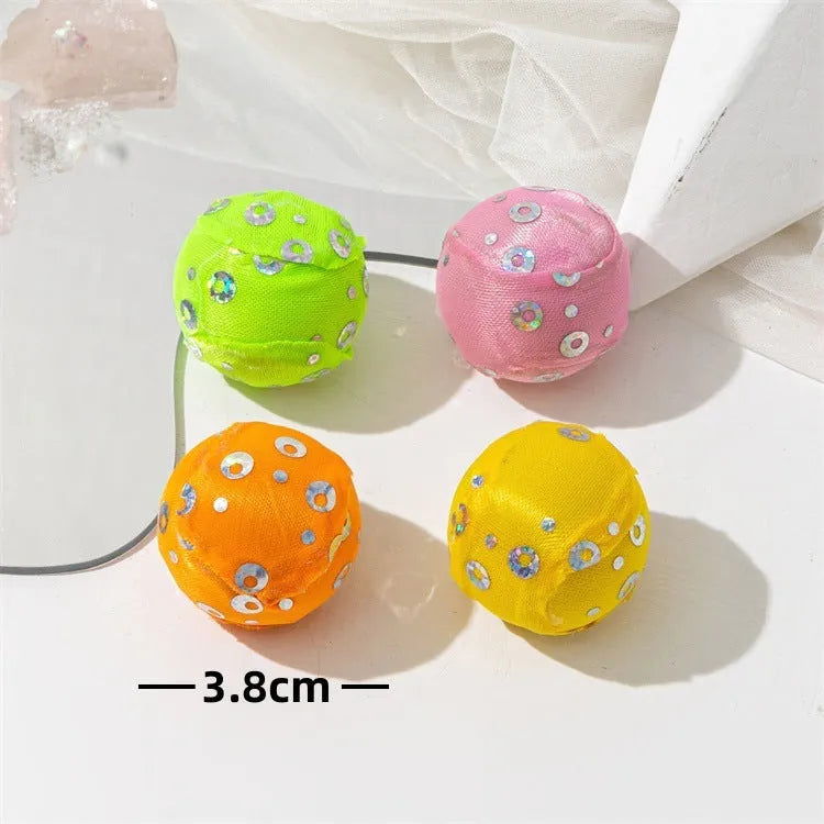 Colored plastic bell mesh hollow sound cat teasing ball in rainbow colour