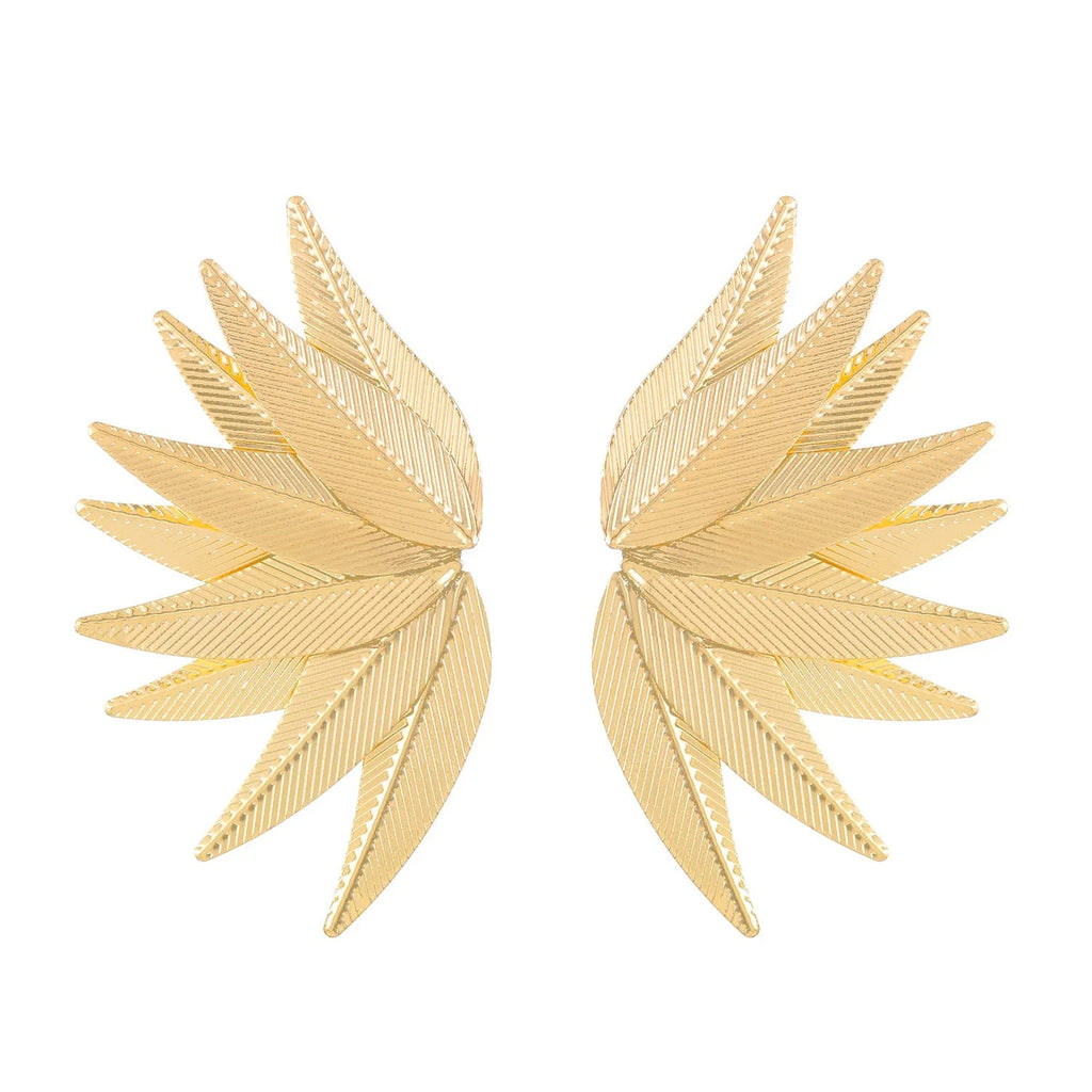 Alloy metal leaf silhouette earrings in white and gold colour options showing botanical jewellery design