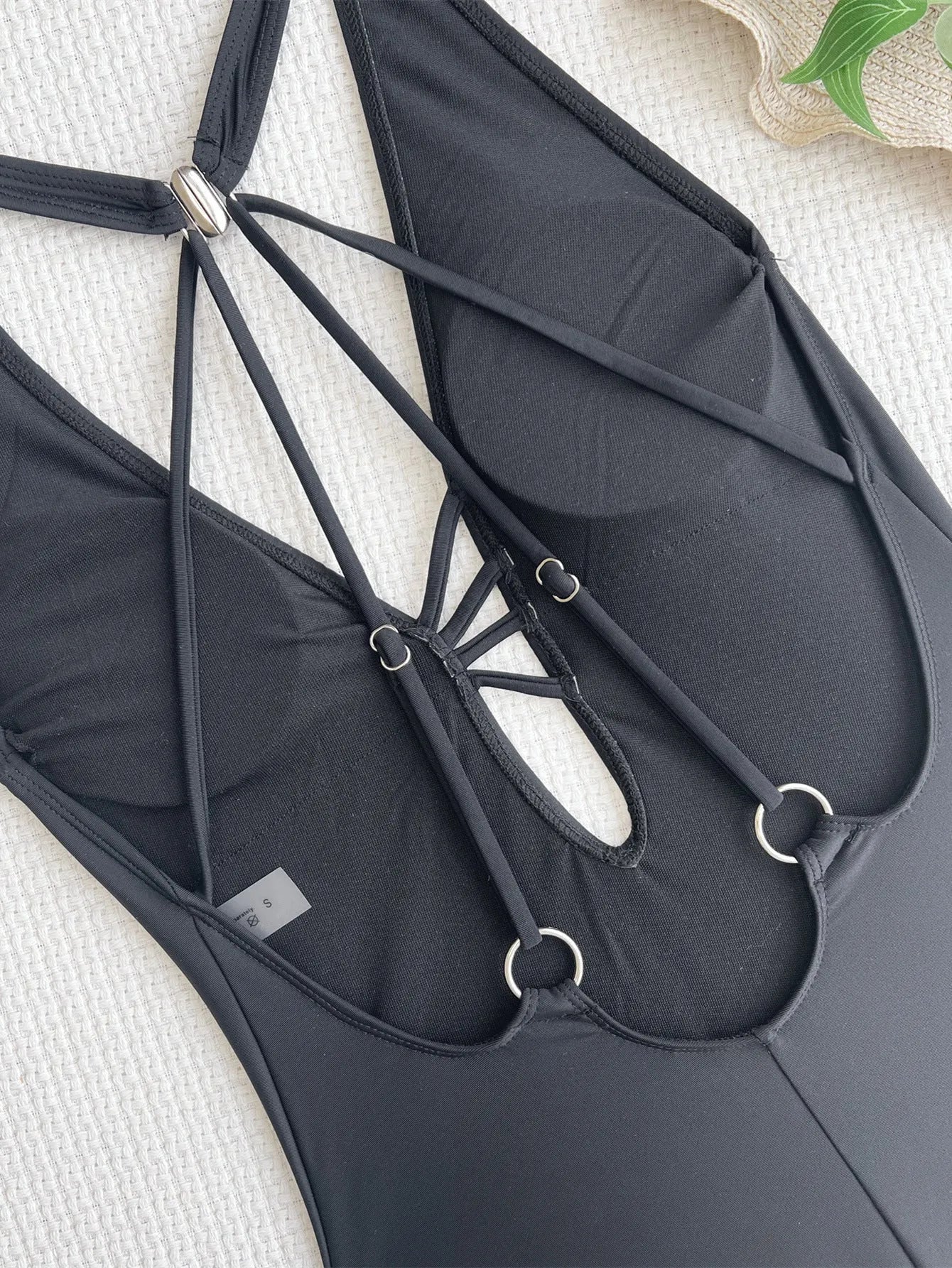 Ladies solid black one-piece bikini swimsuit made from nylon fabric
