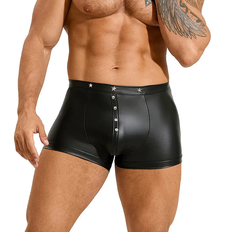 Men's black PU leather boxer shorts with U pouch design laid flat, showing sleek material and construction.