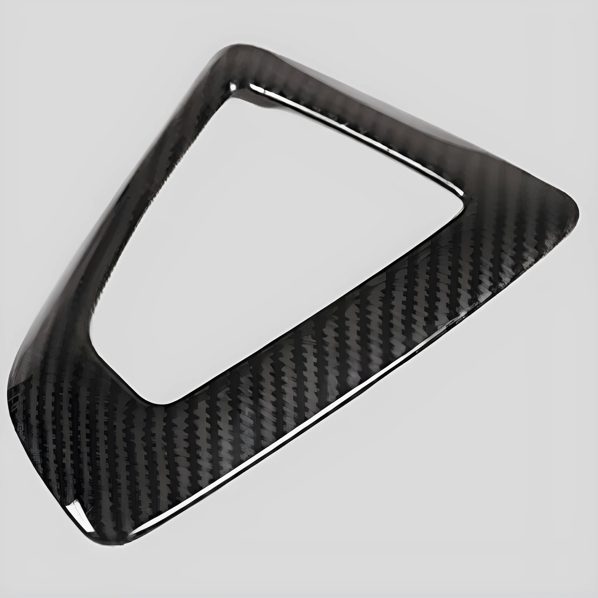 BMW dashboard gear base frame accessory with carbon fibre pattern and 3M adhesive backing