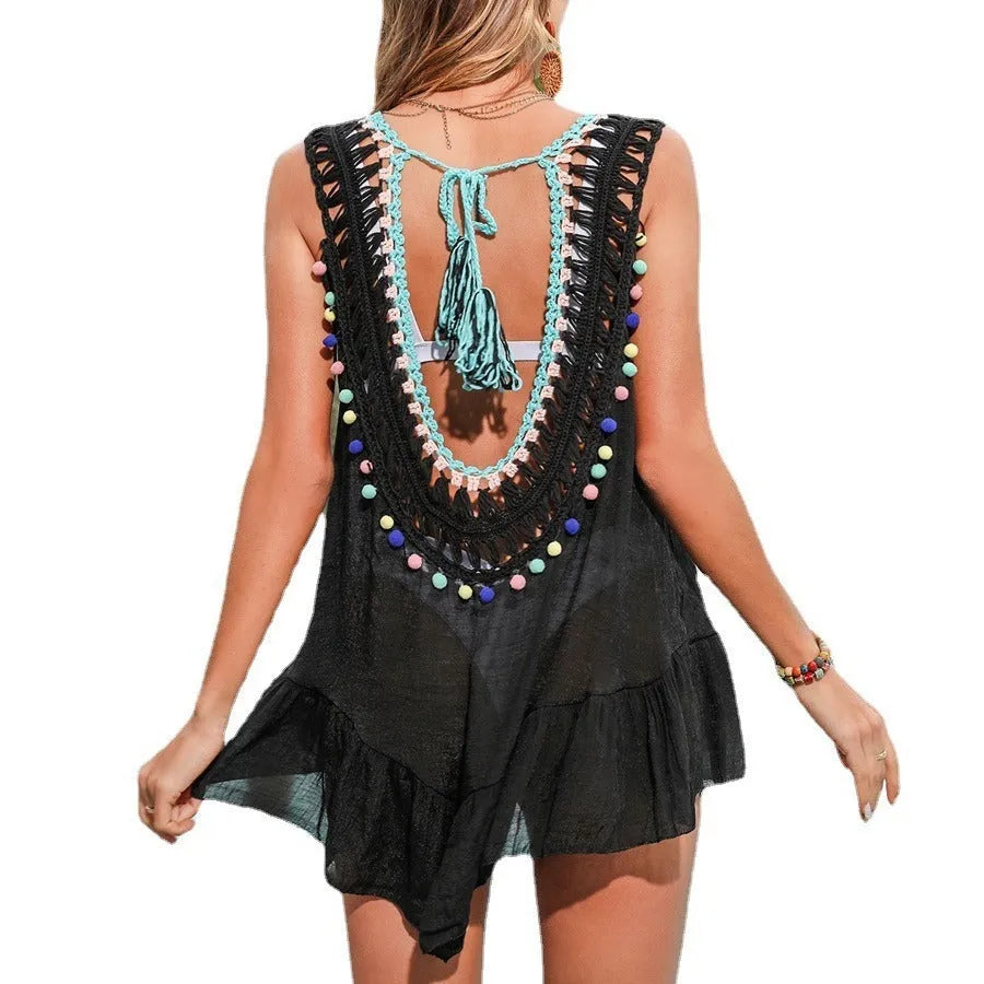 Black hand-crocheted women's beach cover-up vest with cut-out design for swimming