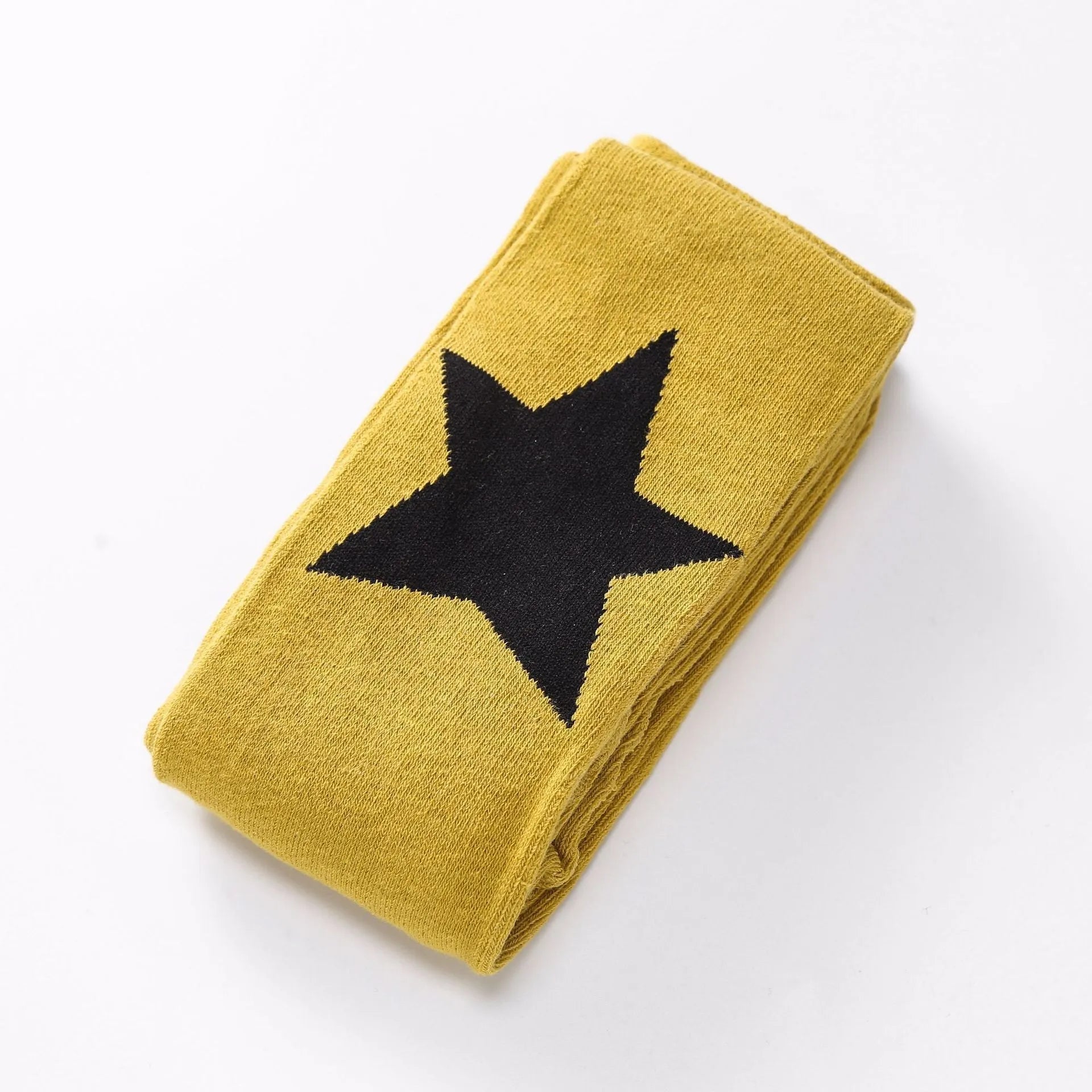 Girl's cotton leggings with five-pointed star and heart patterns in solid colour design