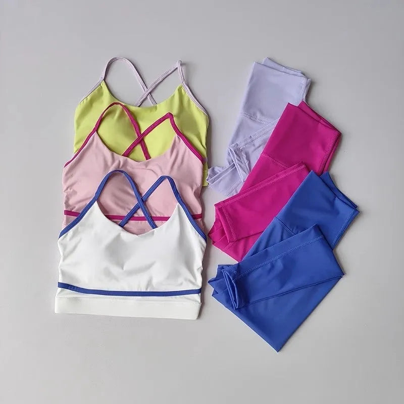 Women's blue and white sleeveless tank top and cropped nylon spandex leggings sportswear set