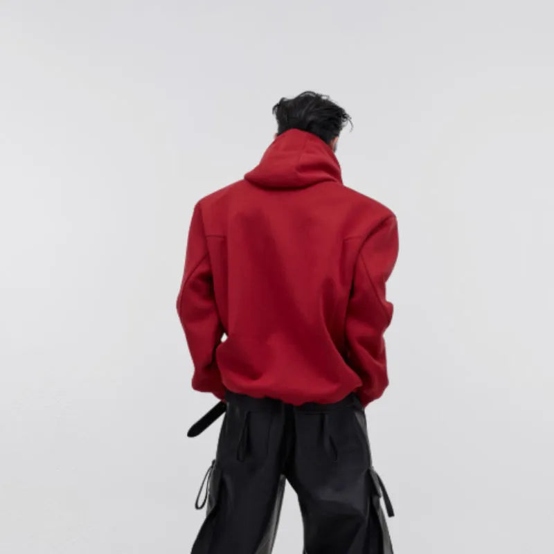 Loose fit red men's hoodie with a bold 3D metal graphic print on the front.