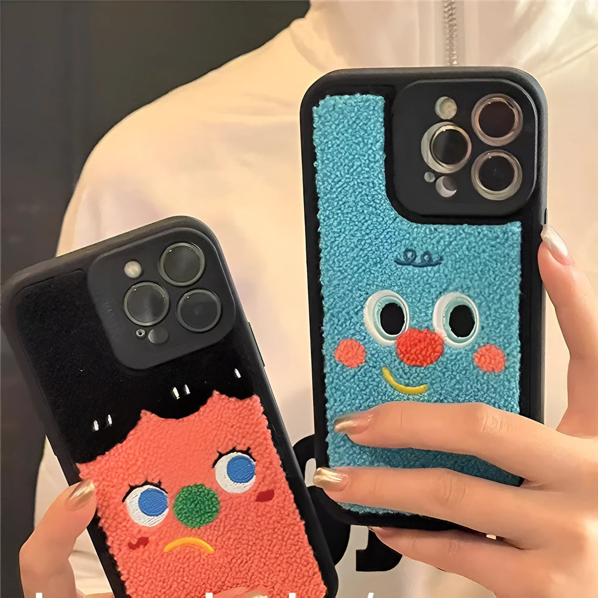 Blue silicone phone case with towel embroidered texture for iPhone, showing rear and side view