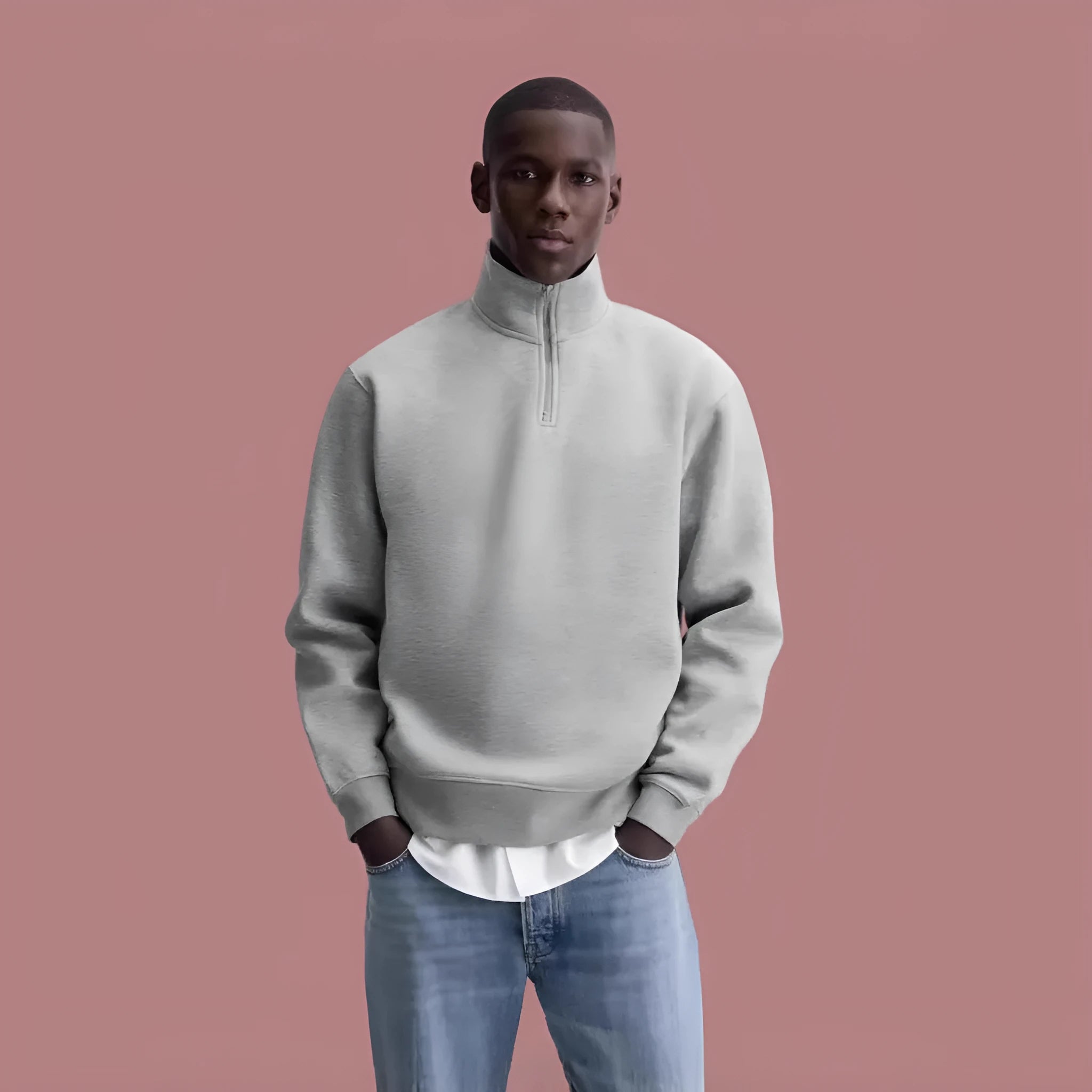 Grey half zipped stand collar cotton sweater hoodie for men and women on a hanger