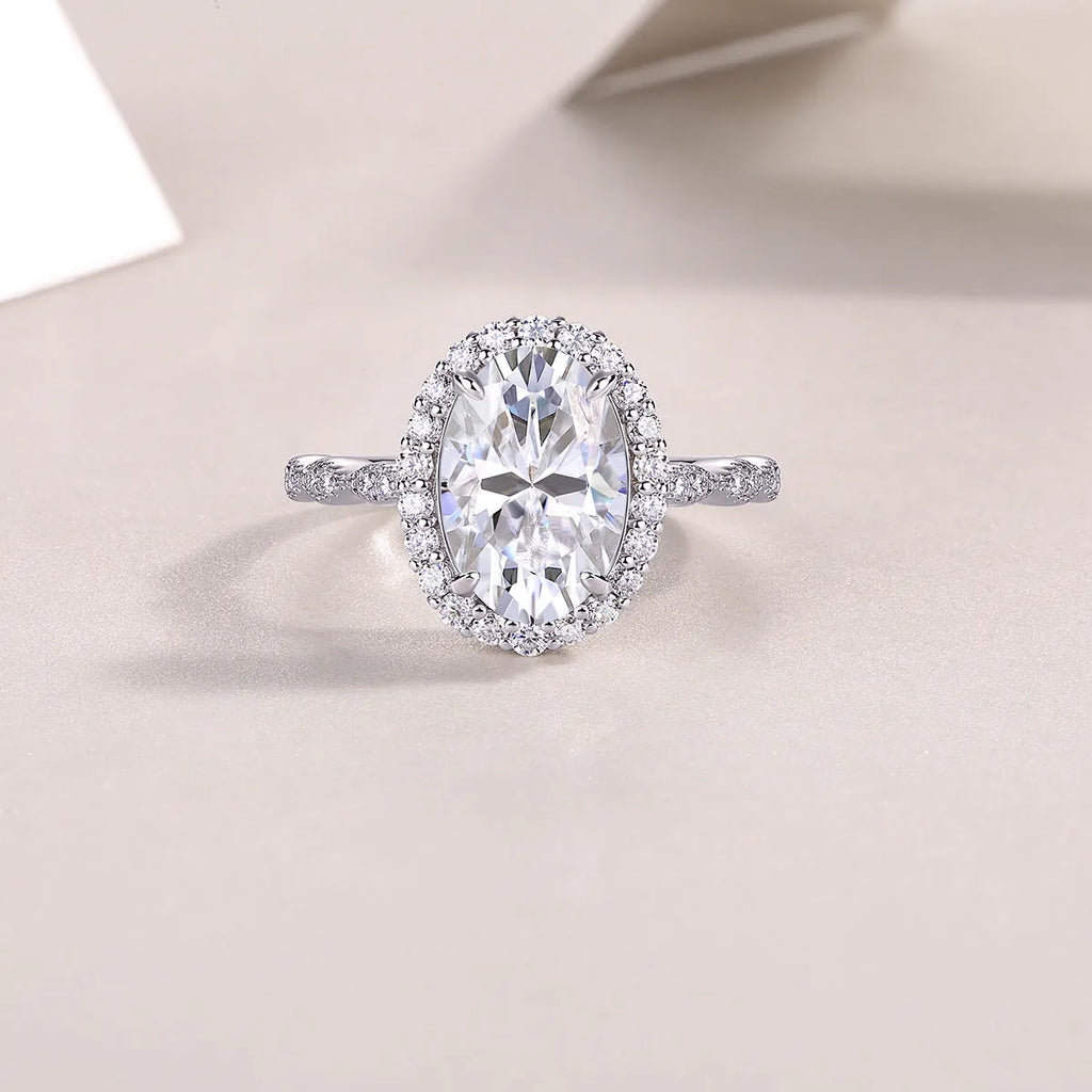 Egg-shaped moissanite wedding ring set in S925 silver with platinum plating, 8x12mm stone, sizes 5-9