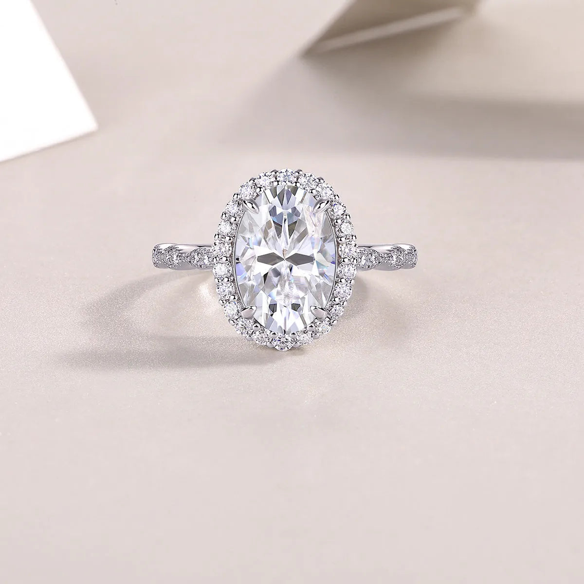 Egg-shaped moissanite wedding ring set in S925 silver with platinum plating, 8x12mm stone, sizes 5-9