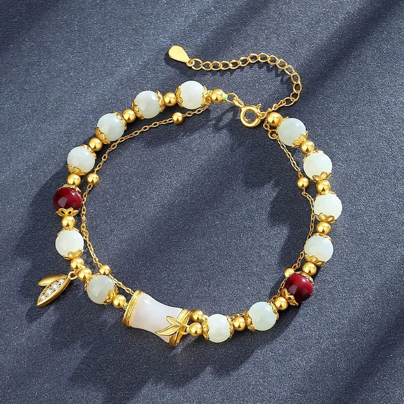 Retro bamboo design bracelet with Ruyi symbol and floral glass beads in electroplated finish
