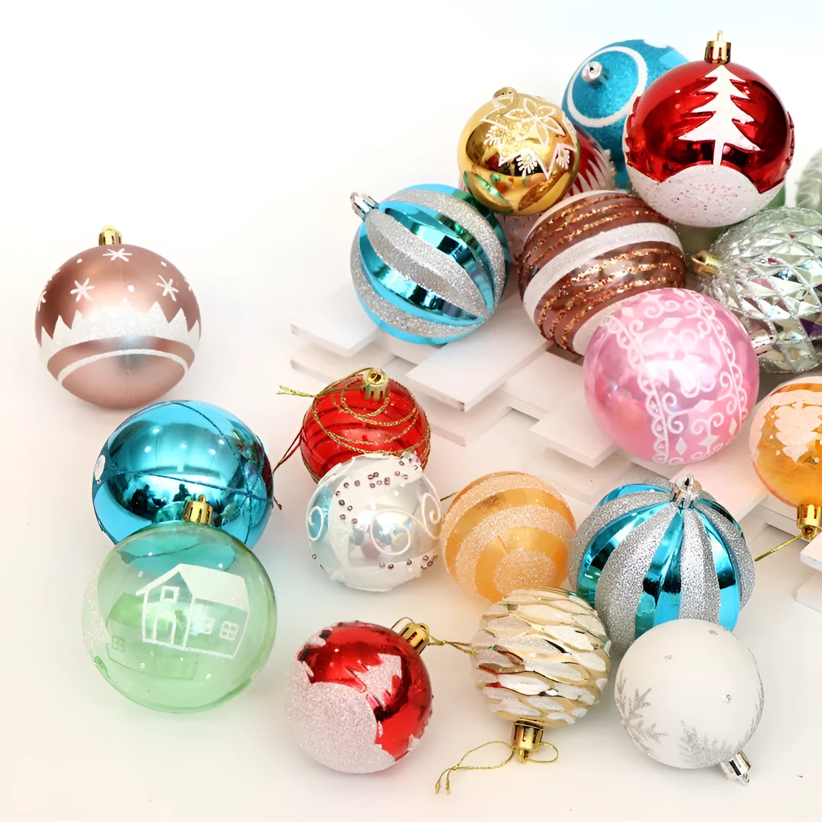 Hand-painted 6cm Christmas tree baubles in gold, red, blue and rose gold colours