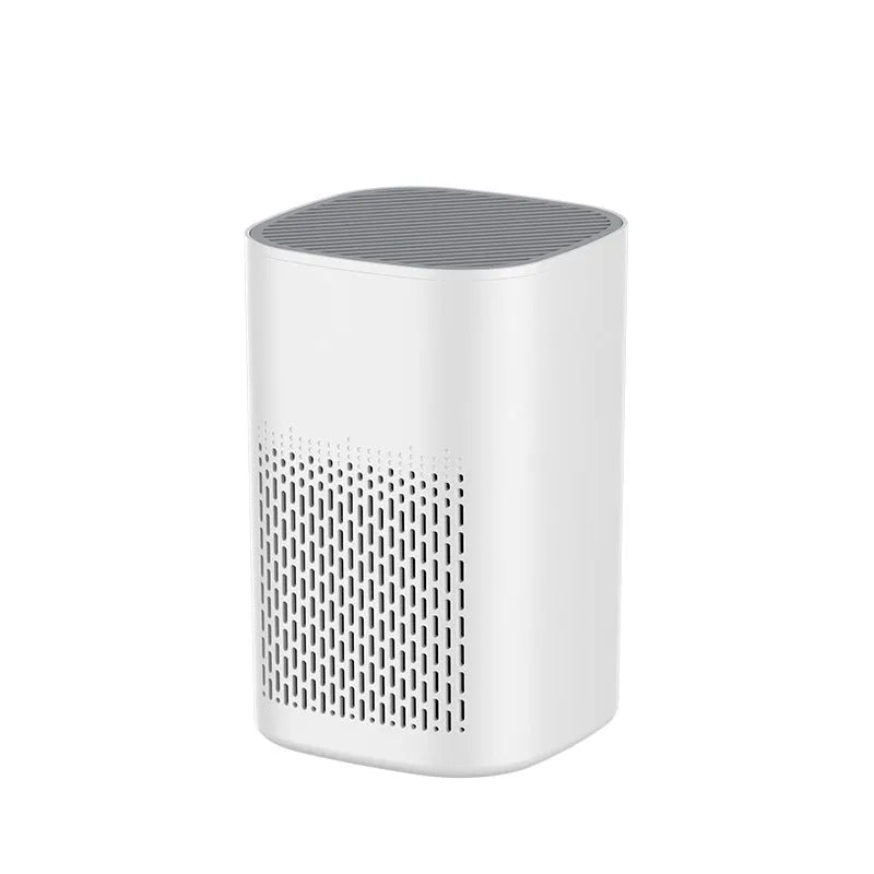 Simple-style desktop air purifier with USB port on a wooden desk.
