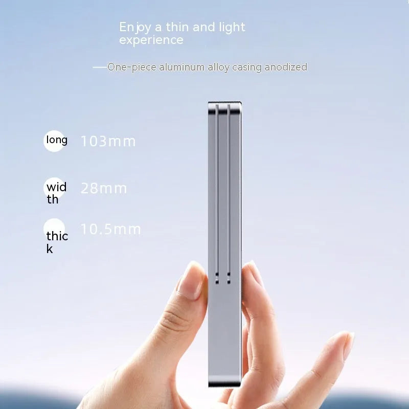 Dark grey aluminium external hard drive enclosure for M.2 SATA and NVMe SSDs with connecting cables.