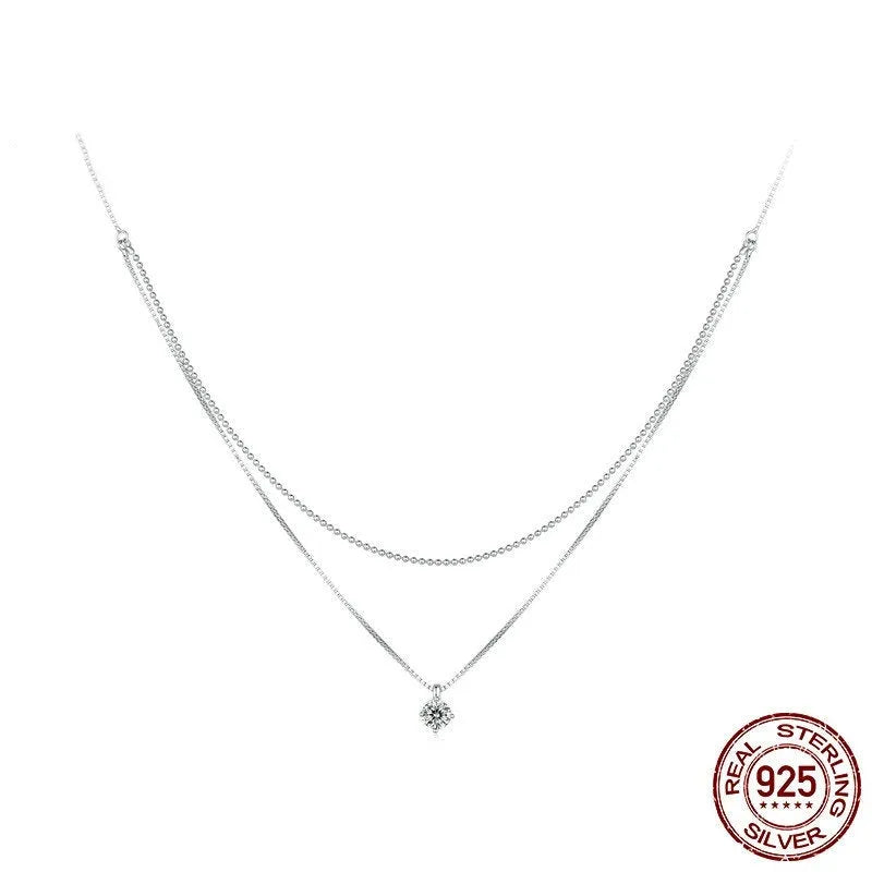 Double-layer sterling silver necklace with pearl chain and adjustable clasp