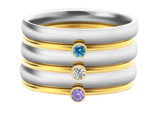 Titanium steel engraved ring with December birthstones in geometric design on gold electroplated band