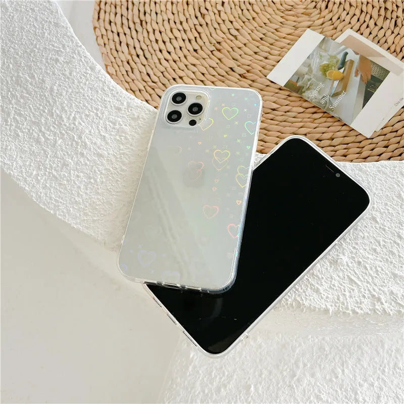 Transparent silicone mobile phone case featuring a Laser Love design, shown fitted on an iPhone.