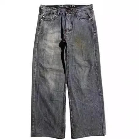 Grey washed-out men's wide-leg jeans with a retro worn look on a mid waist.