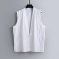 Man modelling a solid grey linen sleeveless vest with a loose fit.