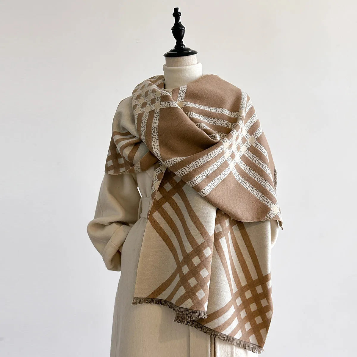 Qianjin mid-length brown imitation cashmere scarf with tassels laid flat showing 185cm length.