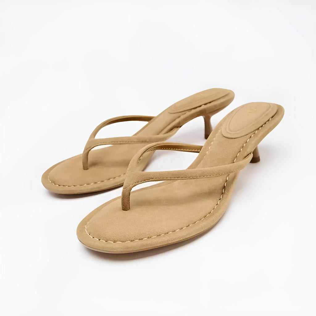 Women's khaki mid-heel flip-flop sandals with round toe and rubber sole on a plain background.