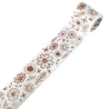 Roll of vintage floral watercolour washi tape on a Japanese paper base, showing patterns like Fog Mountain Forest.