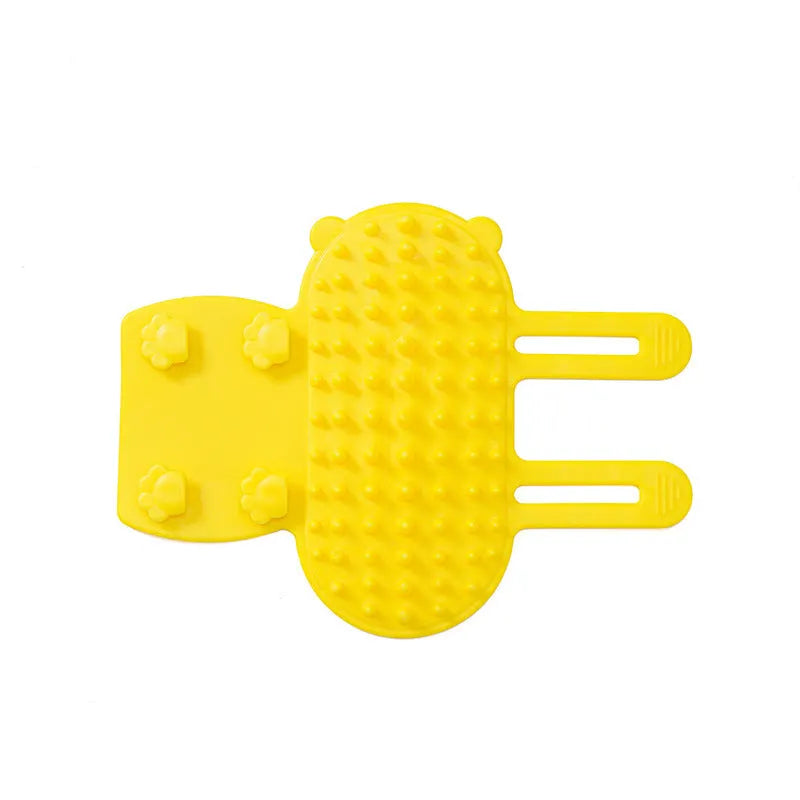 Silicone cat scratching comb with rounded teeth and adjustable strap in black, green, pink, or yellow colour.